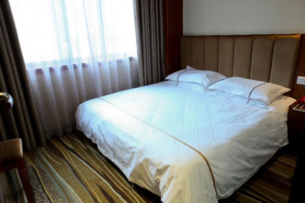 Kaifu Hotel Guangzhou Værelse billede